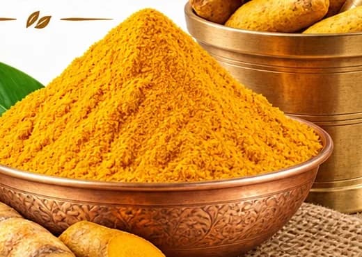 Turmeric powder in a copper bowl